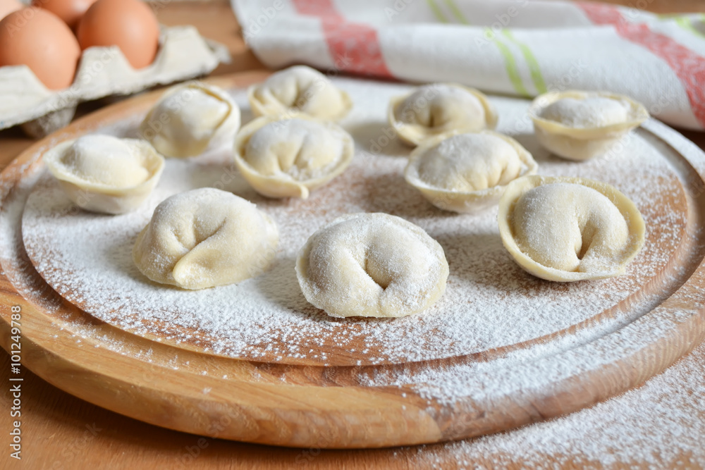 Uncooked dumplings stuffed with meat Uncooked dumplings stuffed with meat