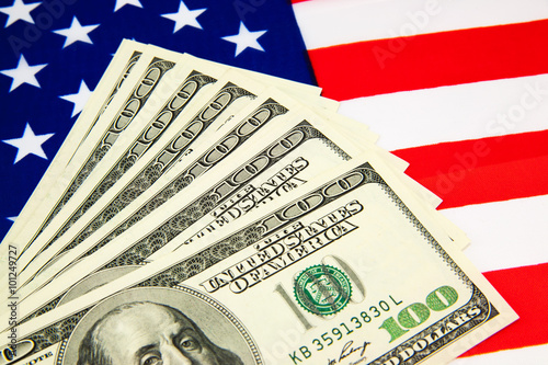 American dollars and flag