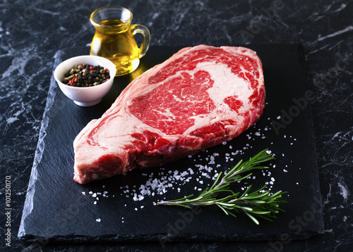 Raw beef steak ribeye loin marble photo