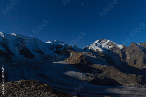 Night view of Bernina massive and glacier photo