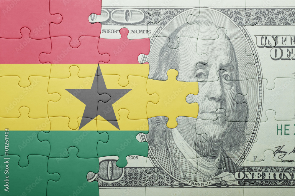 puzzle with the national flag of ghana and dollar banknote