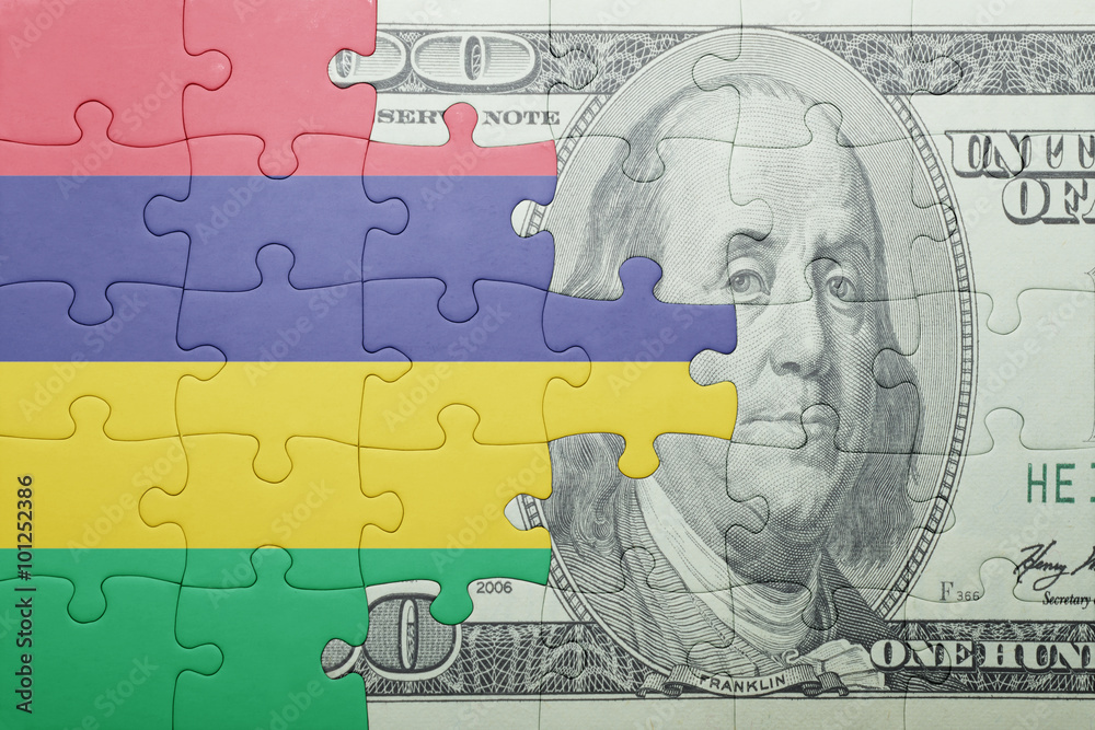 puzzle with the national flag of mauritius and dollar banknote