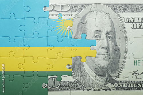 Wallpaper Mural puzzle with the national flag of rwanda and dollar banknote Torontodigital.ca