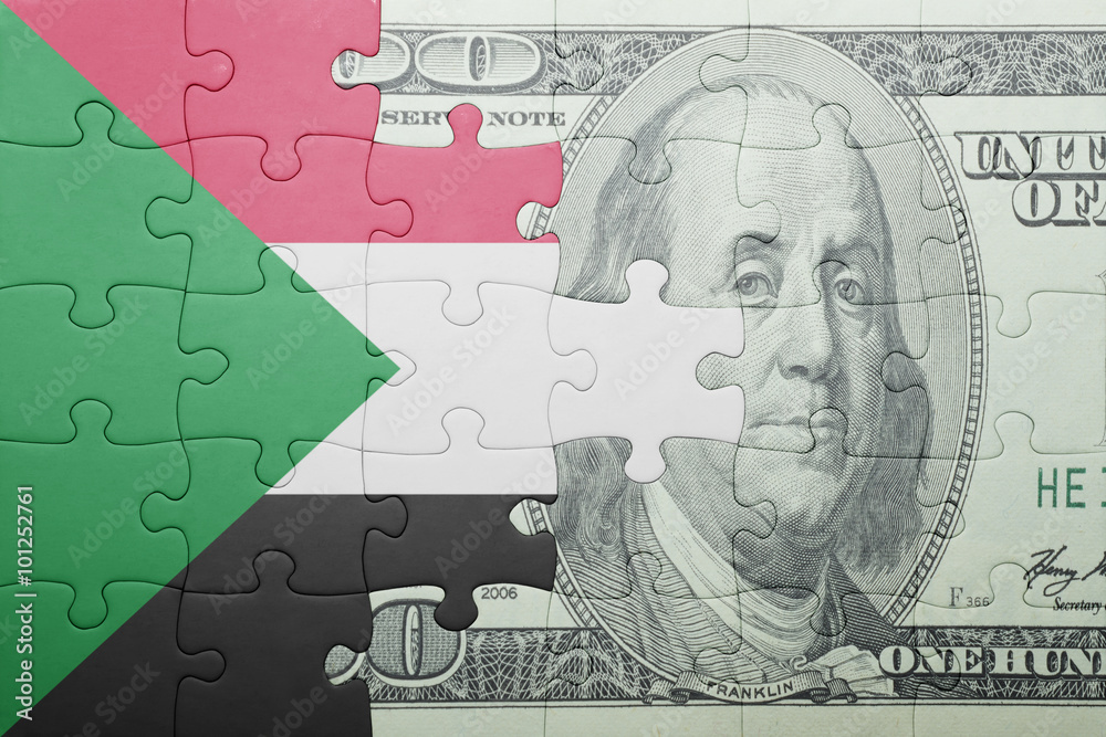 puzzle with the national flag of sudan and dollar banknote puzzle with the national flag of sudan and dollar banknote