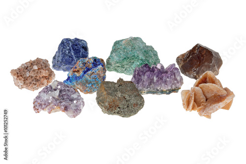 Minerals isolated on white background. The picture was taken with limited depth of field. In the frame there are areas with blur. 
