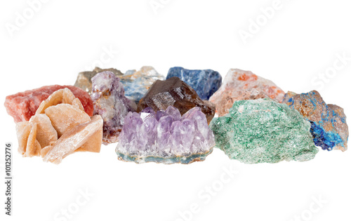 Minerals isolated on white background. The picture was taken with limited depth of field. In the frame there are areas with blur. 
