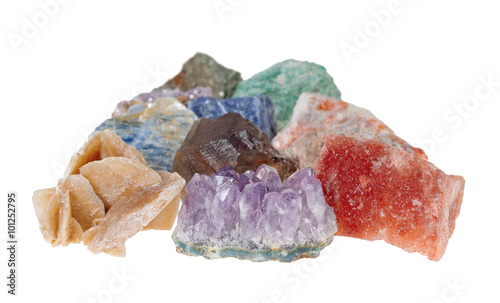 Minerals isolated on white background. The picture was taken with limited depth of field. In the frame there are areas with blur. 
