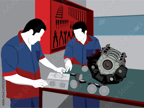 Two mechanics repairing motor