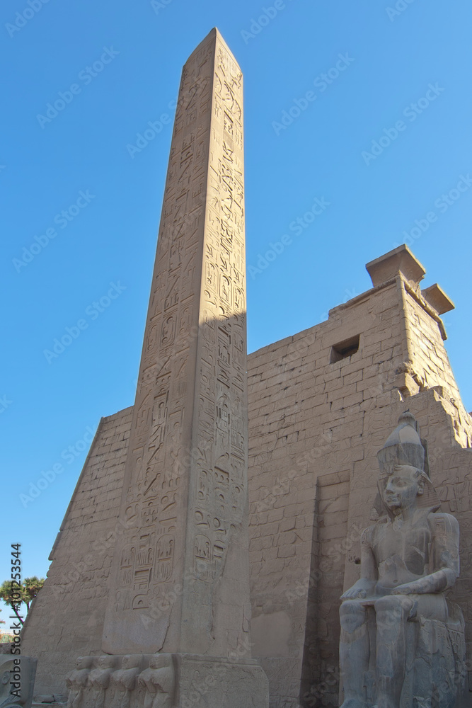 Egyptian Obelisk and statue outside the Temple of Karnak Luxor