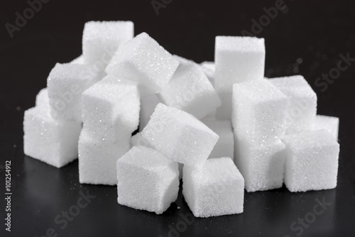 Heap of white sugar cubes