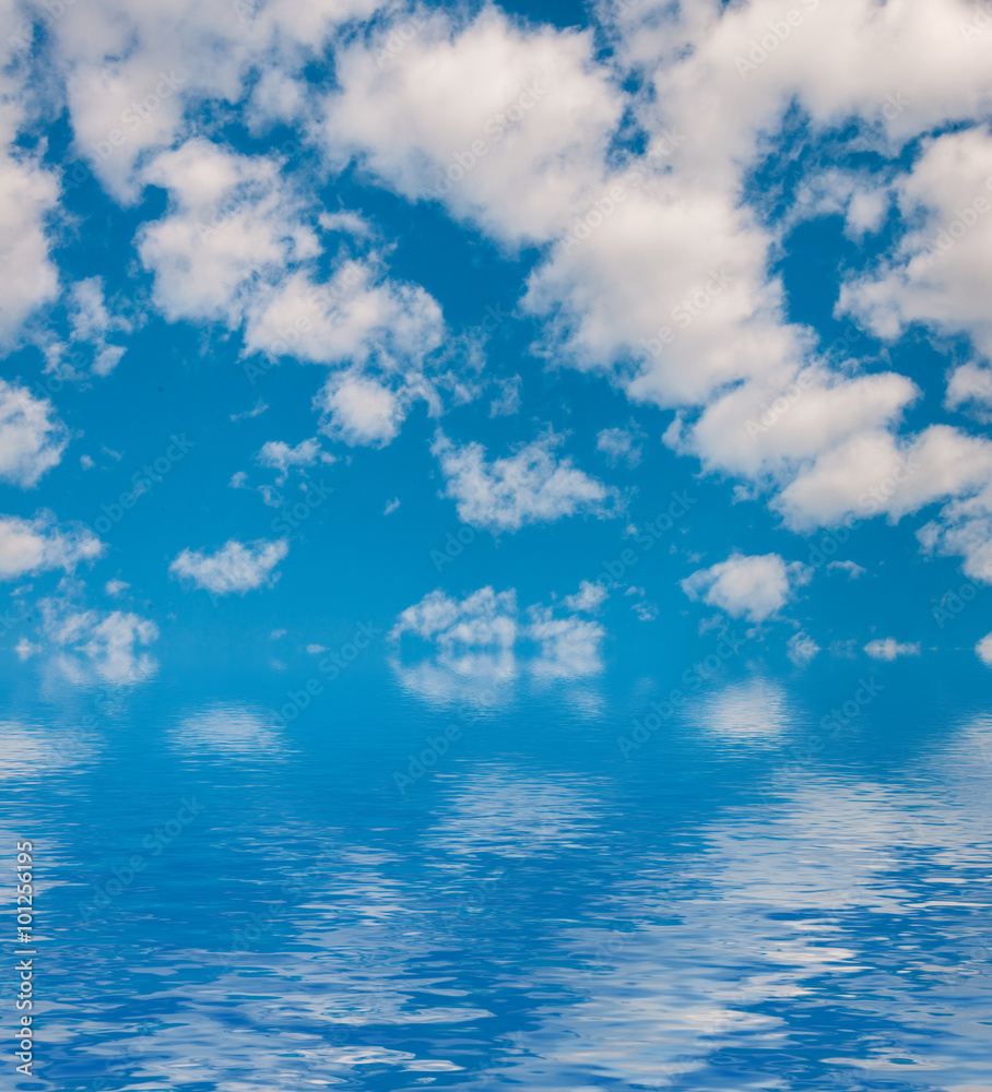 Surface Rippled of water with clouds and sky background
