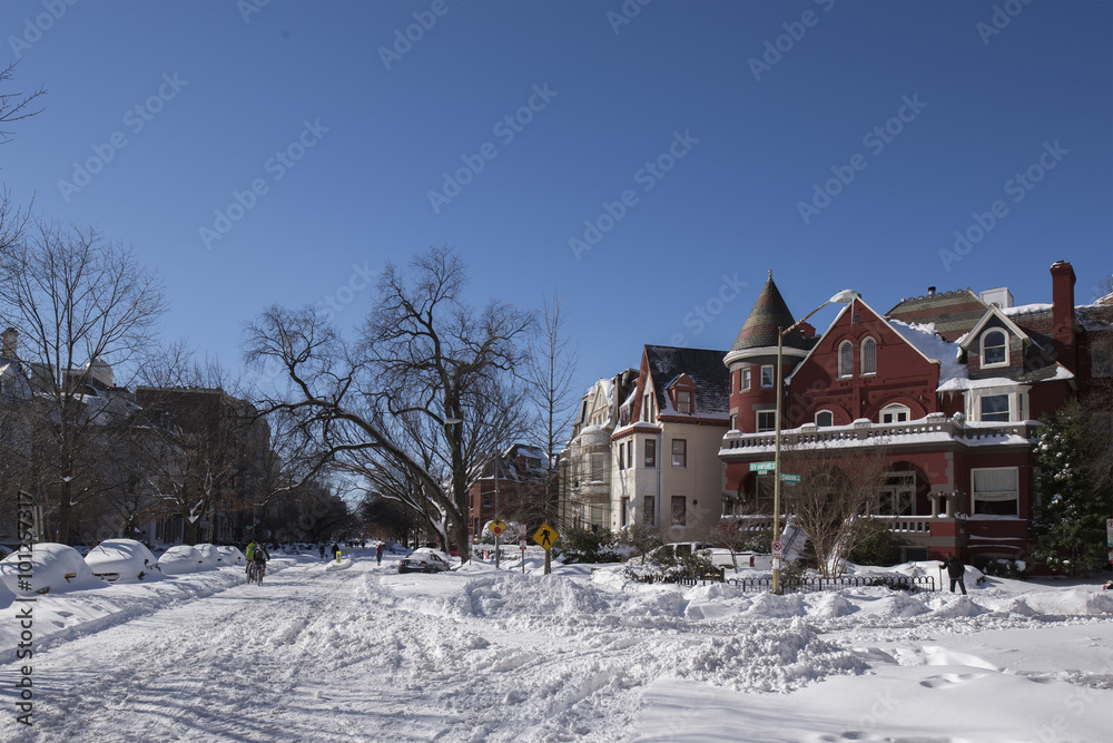 Snow covered streets and homes
