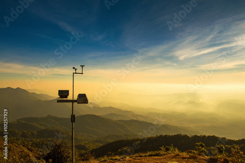 The wind anemometer with landscape. photo