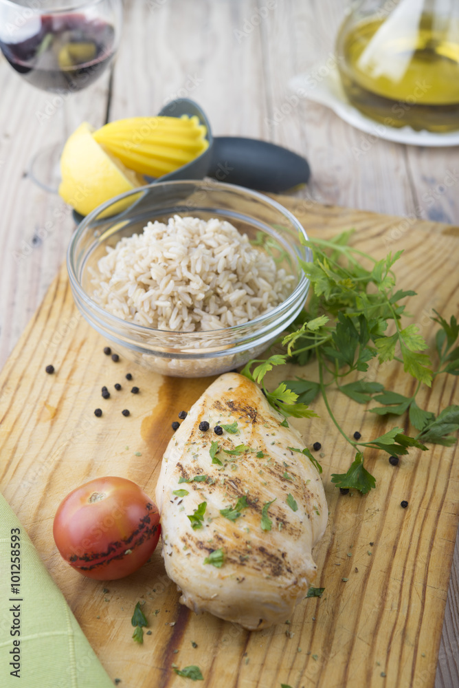 Grilled chicken breast with fresh vegetables . Grilled chicken breast with fresh vegetables .