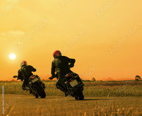 Fototapeta Naklejka Na Ścianę i Meble -  couples friend motorcycle rider biking on asphalt highway agains