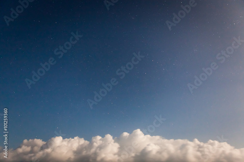 Fototapeta Naklejka Na Ścianę i Meble -  Starry sky and clouds at bottom of image