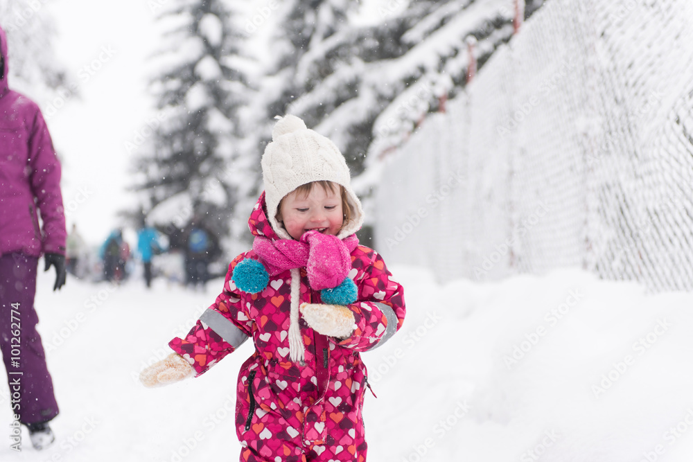 little girl at snowy winter day little girl at snowy winter day
