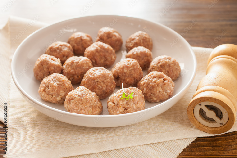 meatballs in ware for roasting, selective focus meatballs in ware for roasting, selective focus