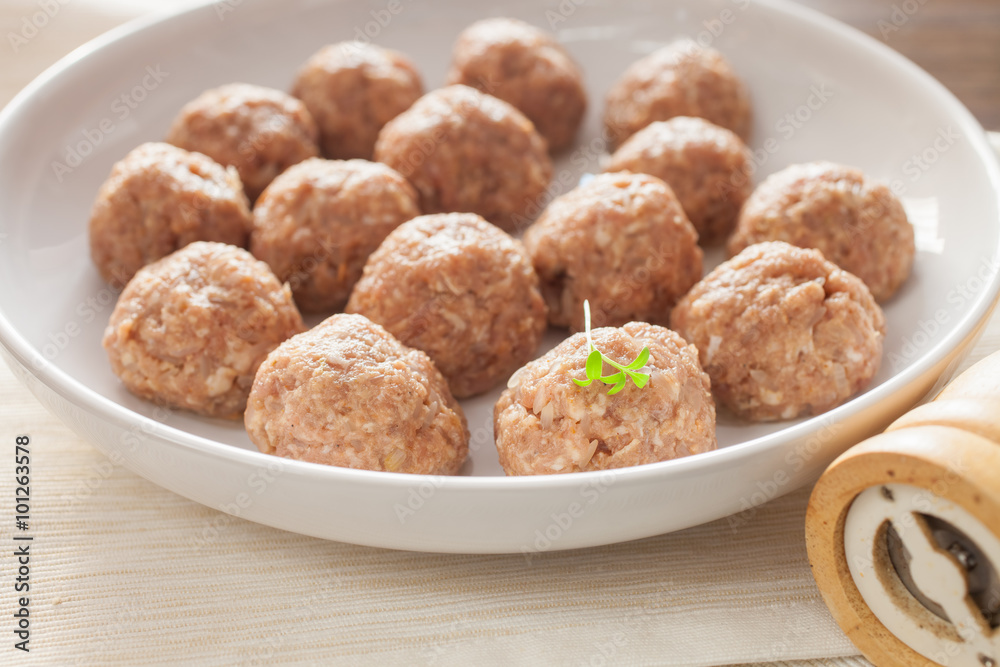 meatballs in ware for roasting, selective focus meatballs in ware for roasting, selective focus