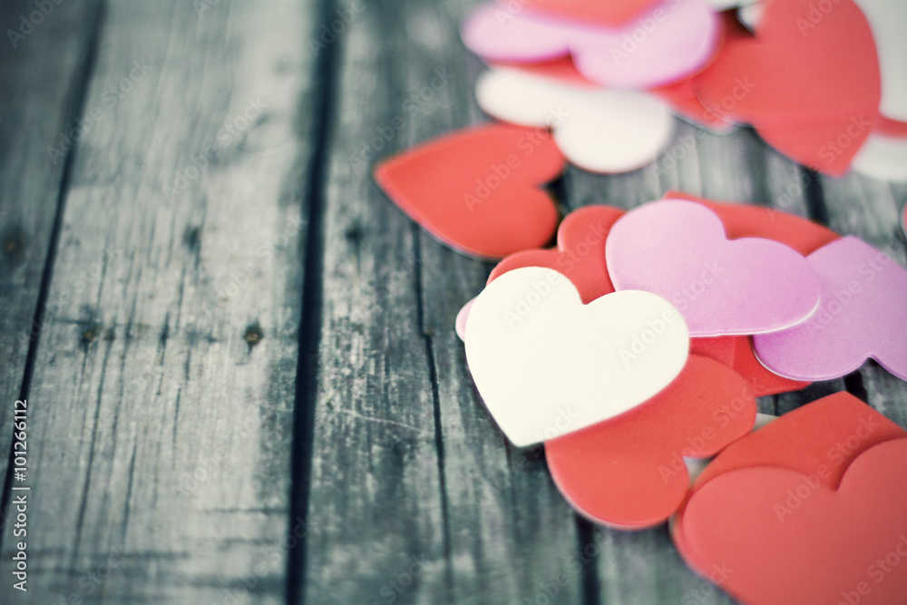 Fototapeta premium wood table with hearts decorating with vintage look