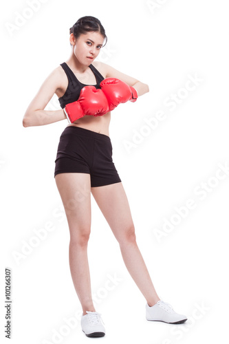 Boxer - fitness woman boxing wearing boxing gloves on white background. © japhoto