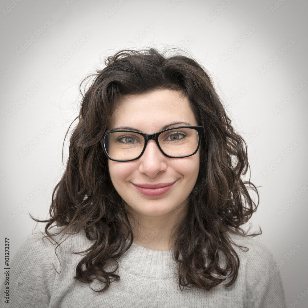 Fototapeta premium Smiling girl with glasses