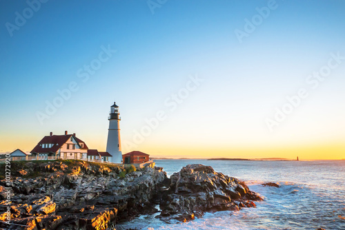Portland Head Lighthouse at Fort Williams, Maine at sunrise over photo