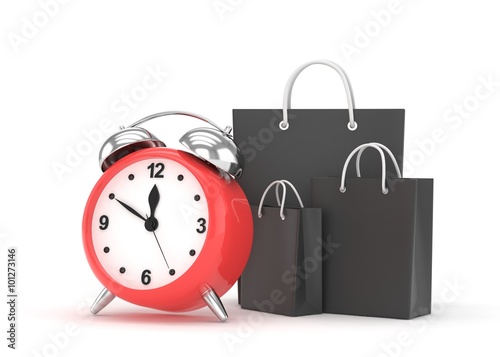 alarm clock and shopping bag (time to buy concept)