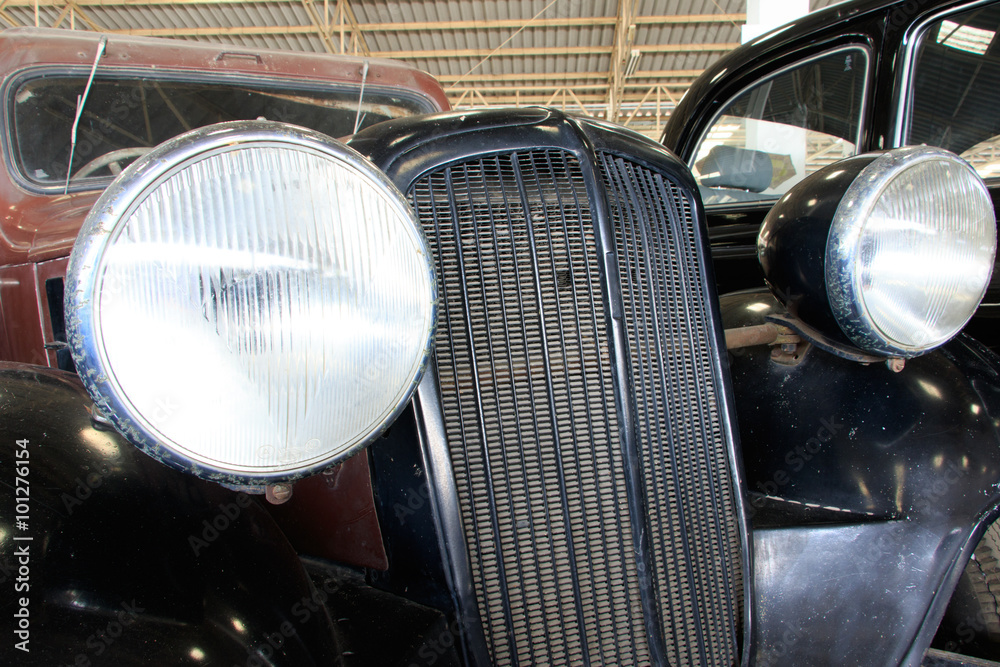 Close Up of Front of a Black Vintage Car