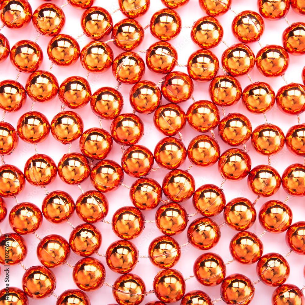 Gold beads close-up xmas background