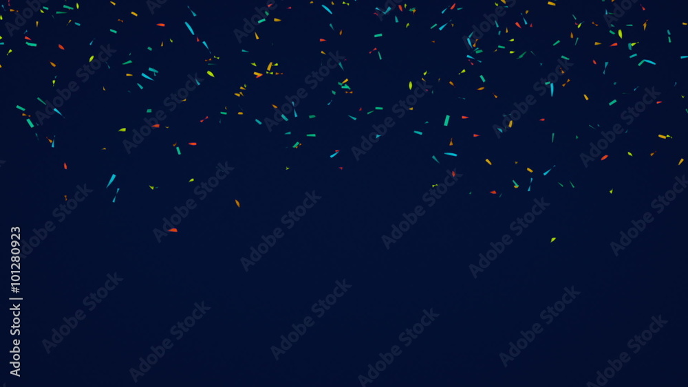 Colorful confetti in front of a blue background - slow motion