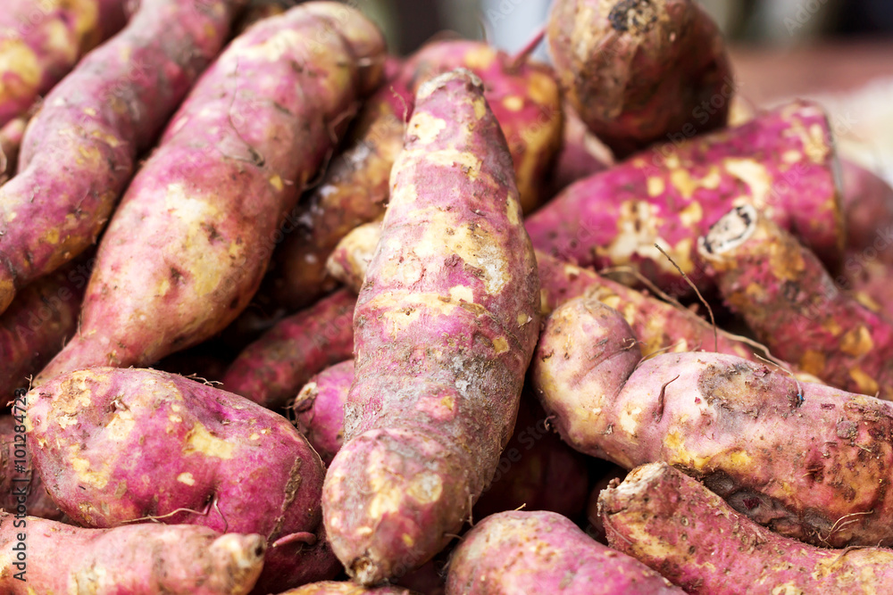 roasted sweet potatoes at street food in thailand roasted sweet potatoes at street food in thailand