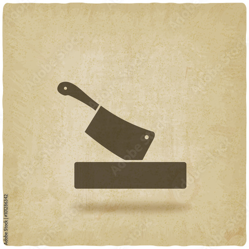 butcher knife in chopping board old background