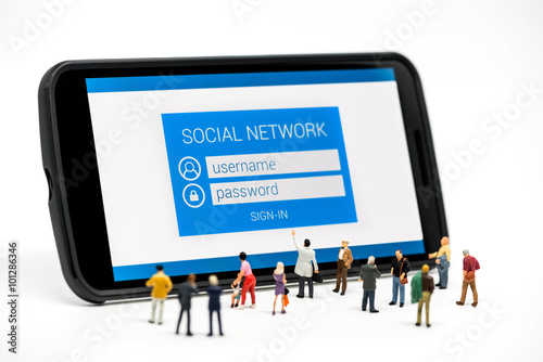  Group of people watching at social network sign in page on smar