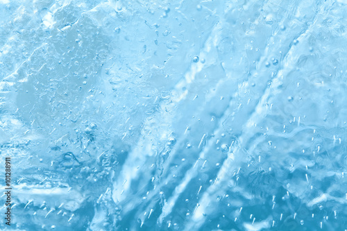 Ice background textured. frozen ice surface of a lake. macro view, soft focus