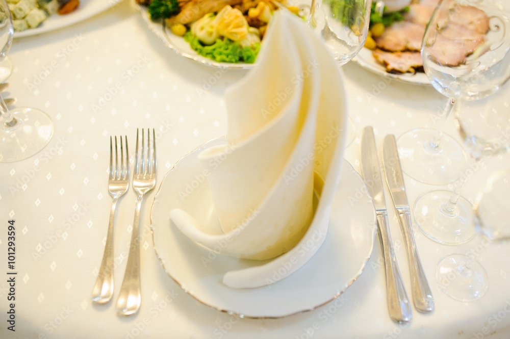 table setting with plate, spoon, fork and knife table setting with plate, spoon, fork and knife