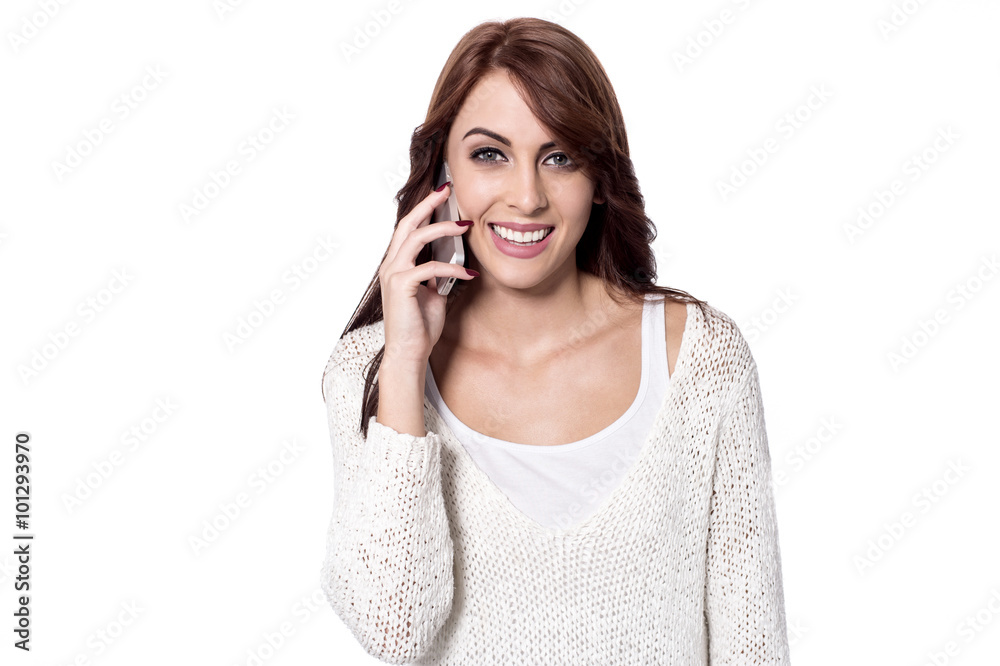Young smiling lady talking on phone Young smiling lady talking on phone