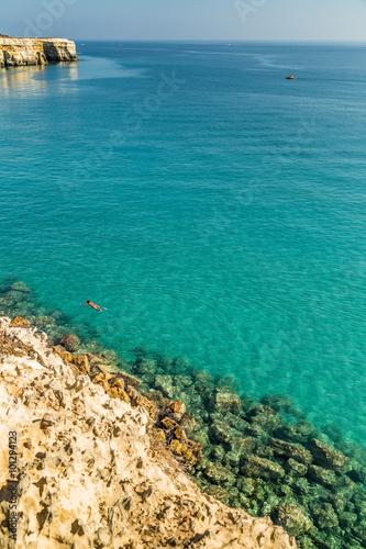 Rocky cove on the coast of Apulia photo