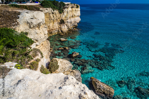 Rocky cove on the coast of Puglia photo