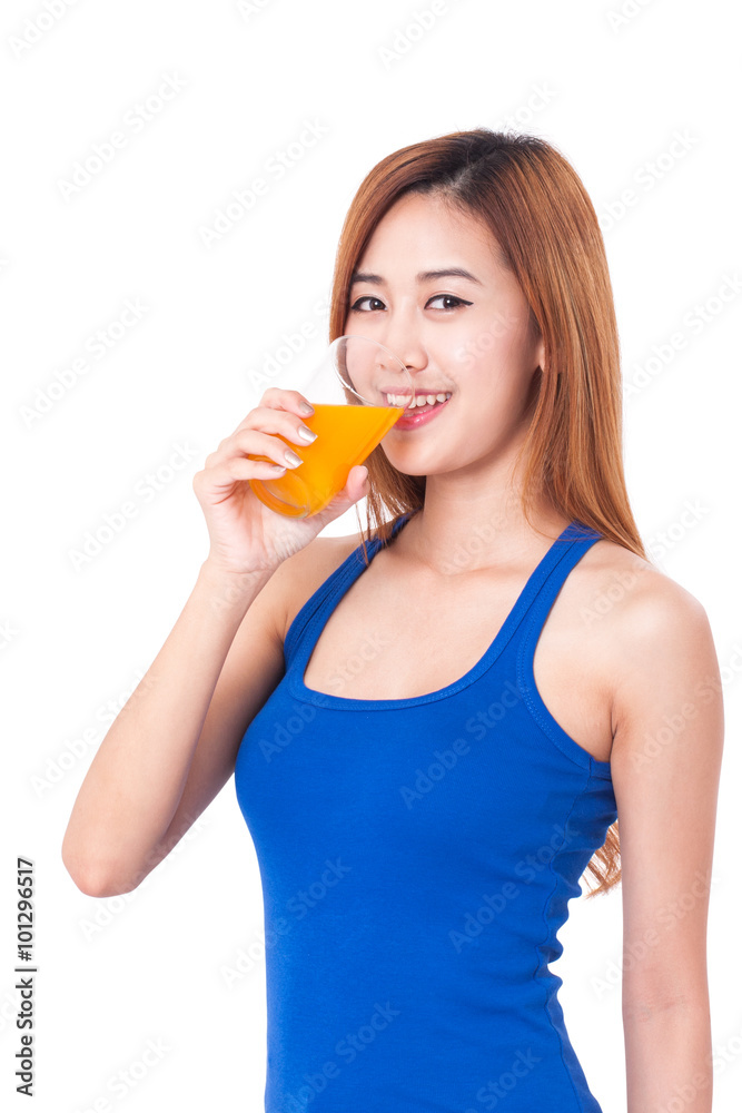 Portrait of young woman drinking orange juice. Portrait of young woman drinking orange juice.