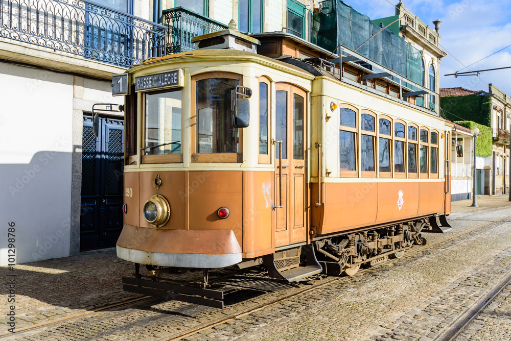 Vintage old retro tram on the street of the town, Porto, Portugal.
