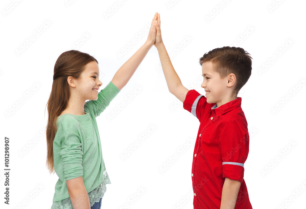 happy boy and girl making high five happy boy and girl making high five