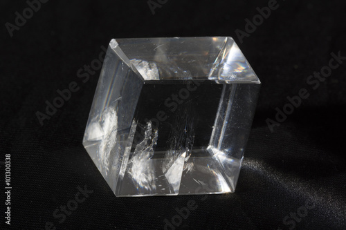 calcite crystals on a black background with an internal imperfections photo