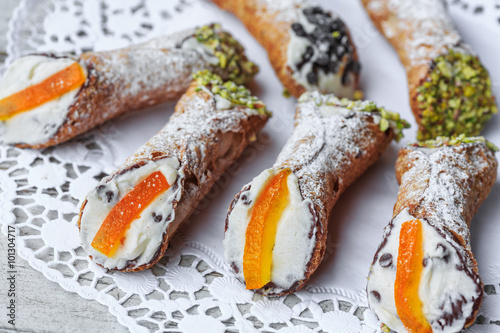 Sicilian cannoli on cake stand