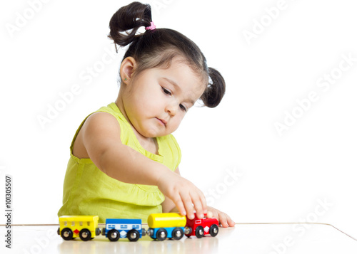 Kid girl playing with train...