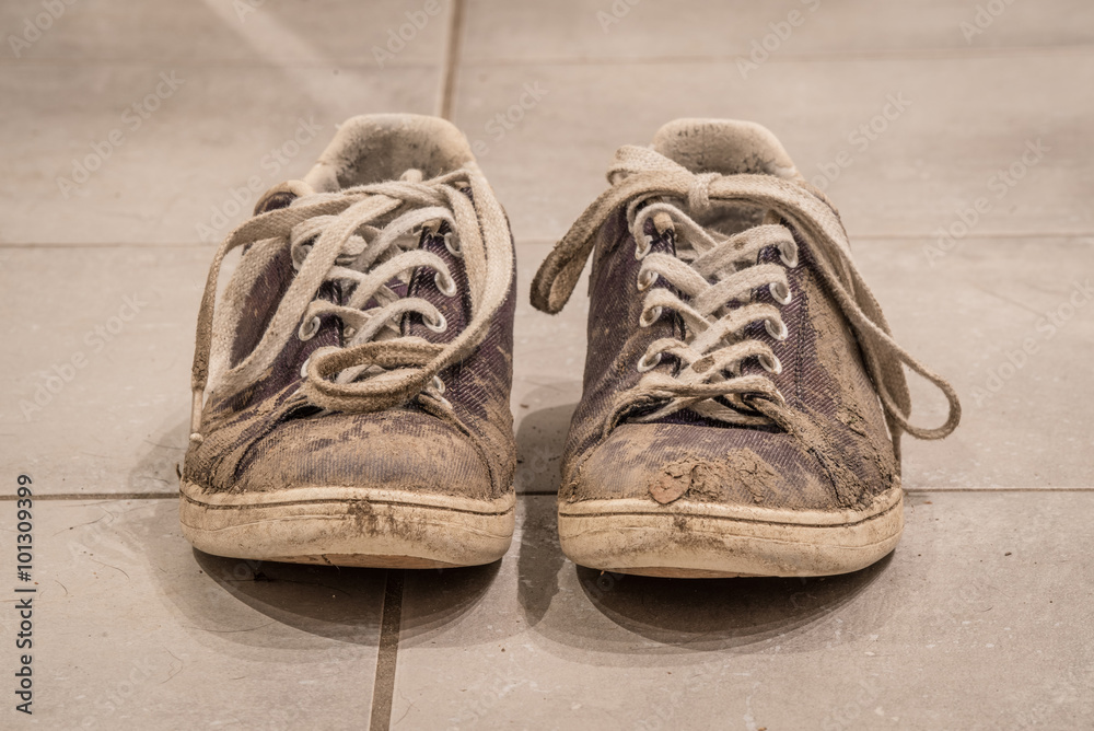 Shoes covered with mud