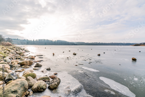 Frozen lake with rocks
