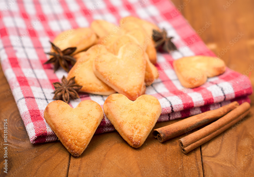 Cookies in the shape of a heart on wooden background Cookies in the shape of a heart on wooden background