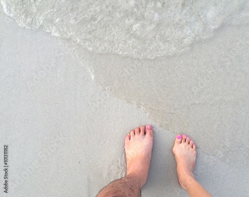 couple feet on beach
