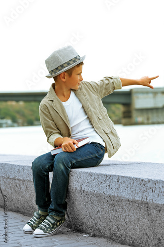 Little boy on the riverside